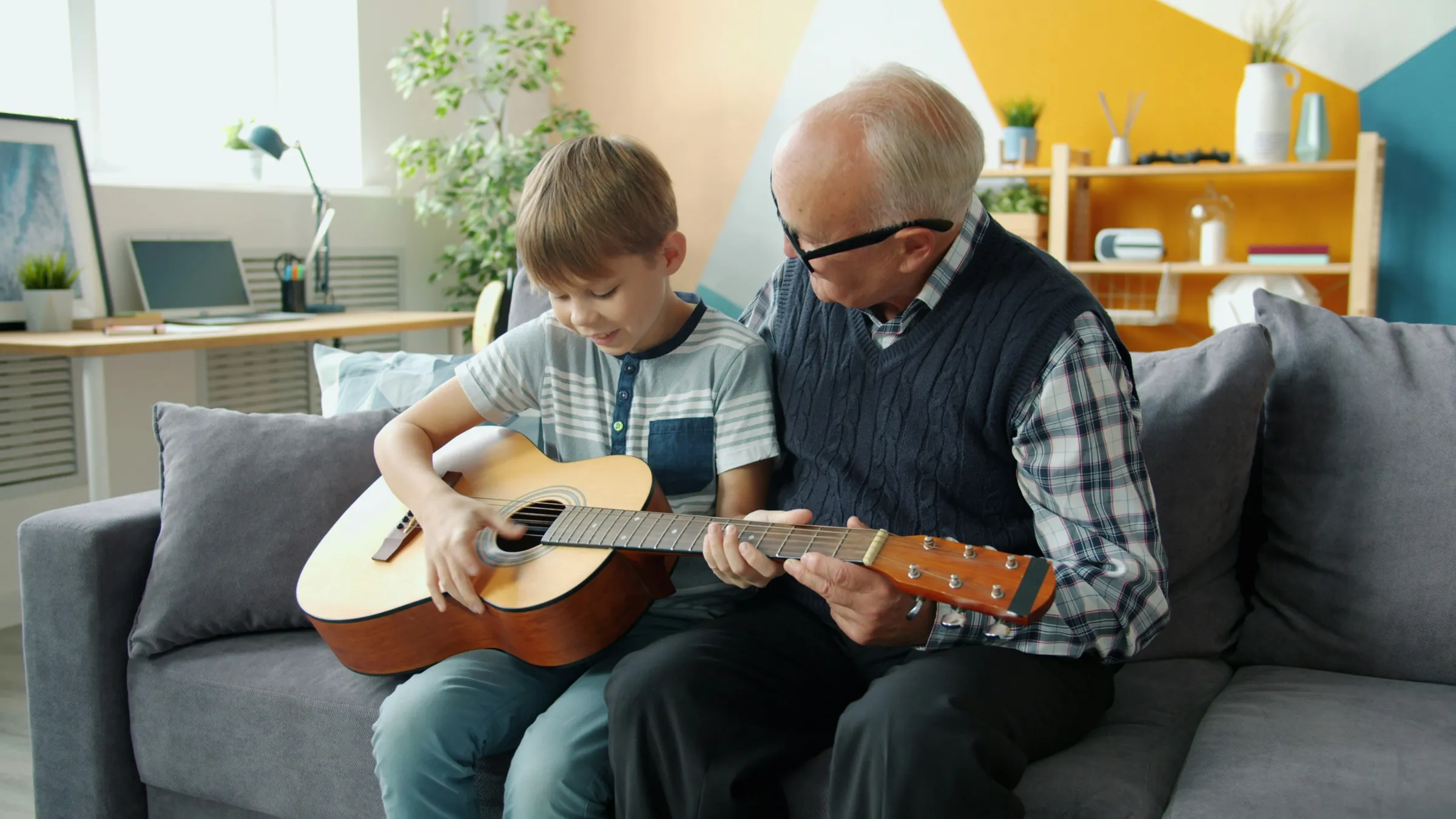 grandson-grandparent-play-guitar